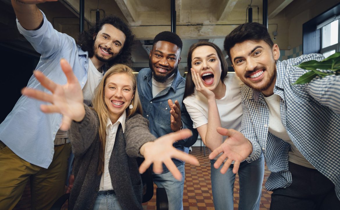 Happy overjoyed business team celebrate corporate victory